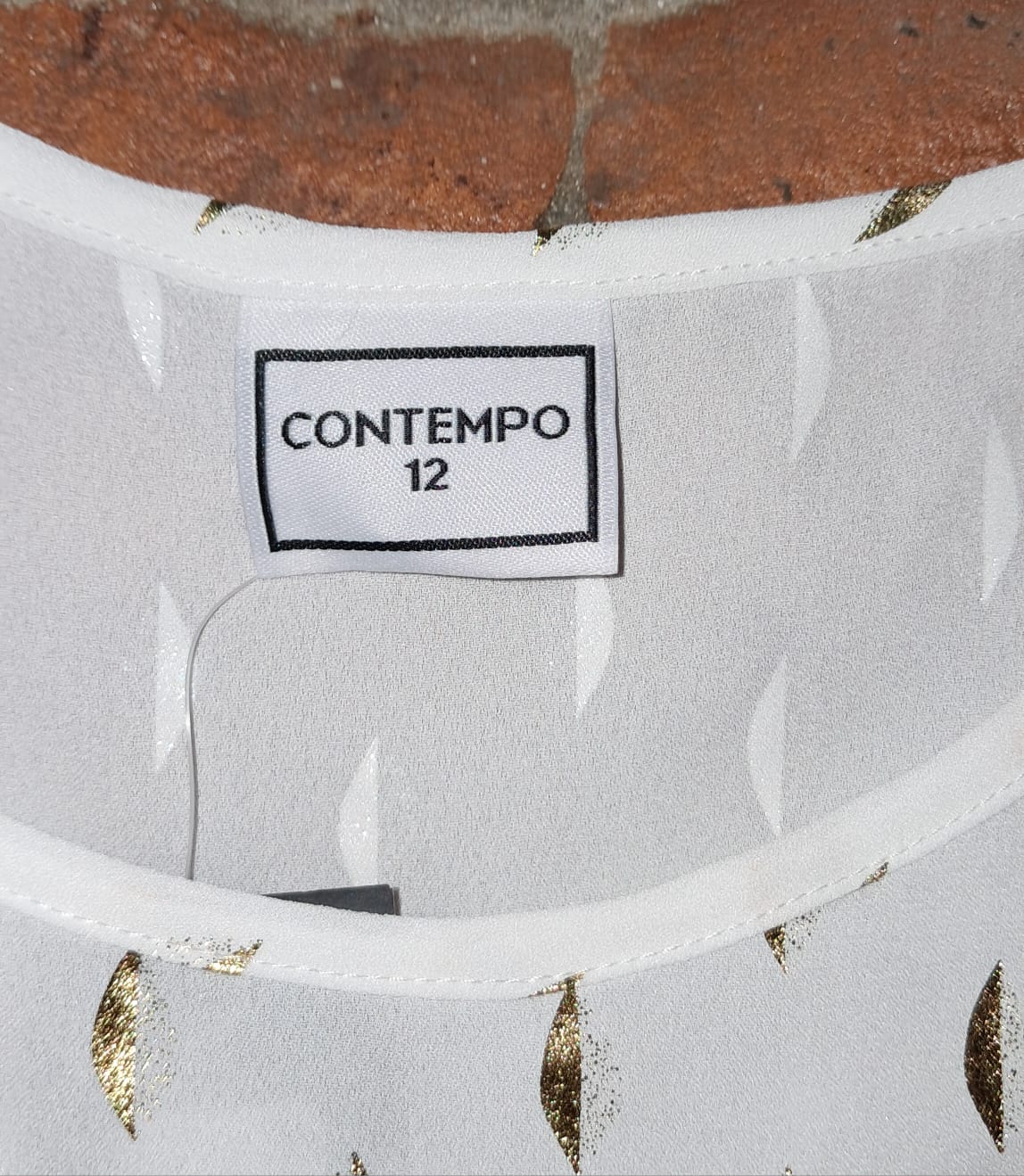 Contempo Sleeveless Blouse